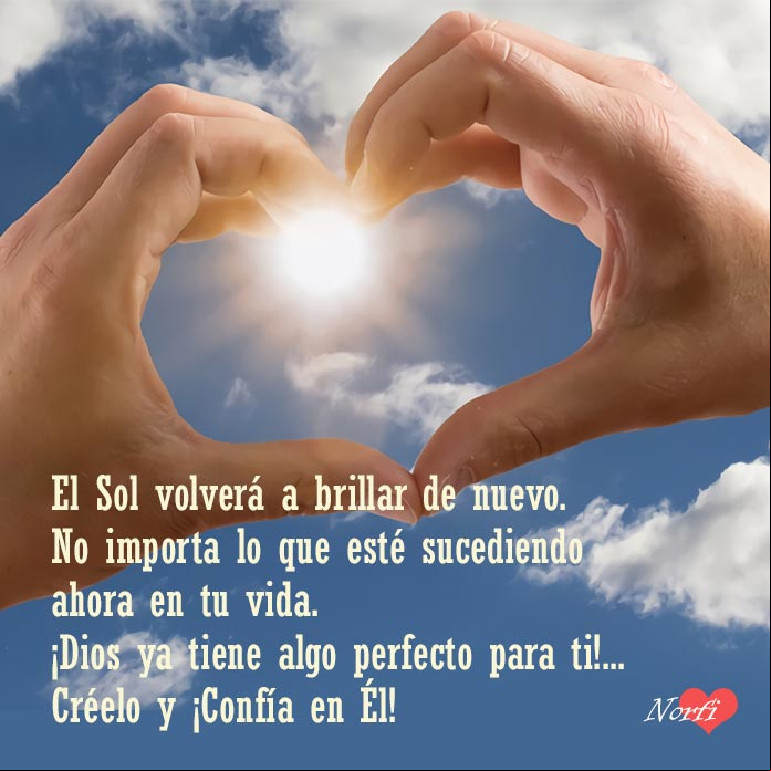Manos en forma de corazon con el sol en el centro